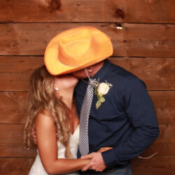 Throw Yo Hands Up Entertainment DJ & Photo Booth Service Michigan Wedding School Aaron Helber Near Me cowboy kiss bride love Throw Yo Hands Up Entertainment